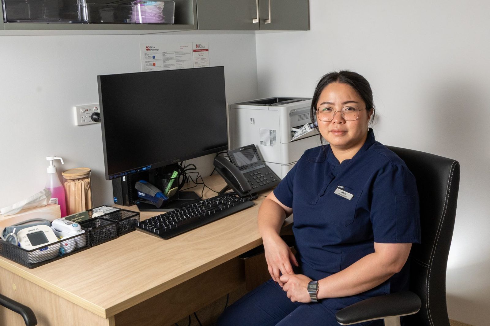 Abby, our practice nurse, at her desk in the treatment room